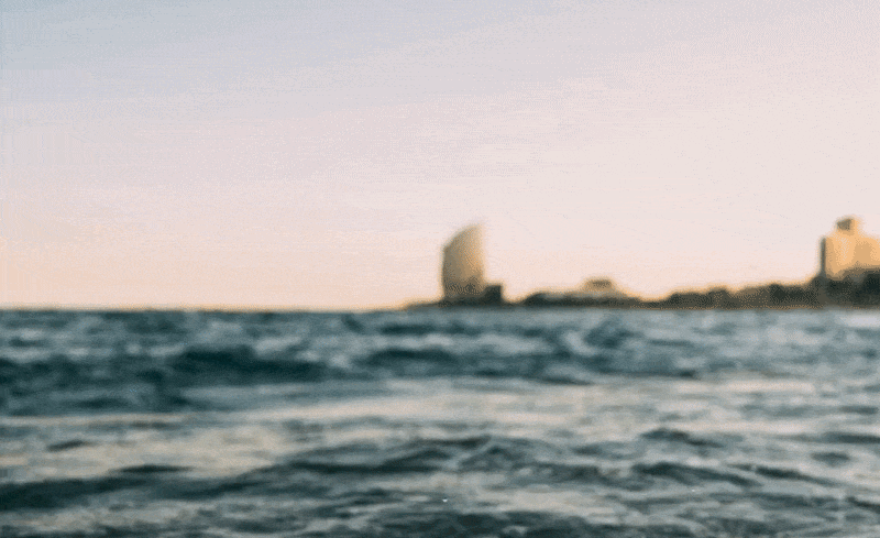 Barcelona skyline from a private boat at Port Olímpic - Nautiq nautical experiences